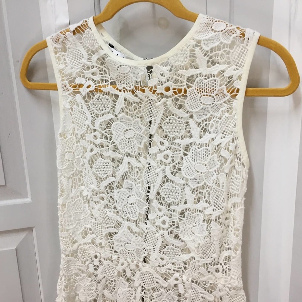 CAbi White Crocheted Lace Sheer Peplum Top - Picture 10 of 16